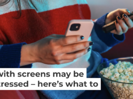 Using multiple digital devices at once can be highly distracting and overstimulating. Riska/E+ via Getty Images